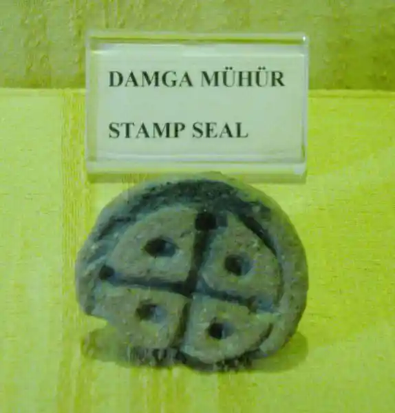 Cross engraved on a stamp seal with four dots in Ephesus Izmir